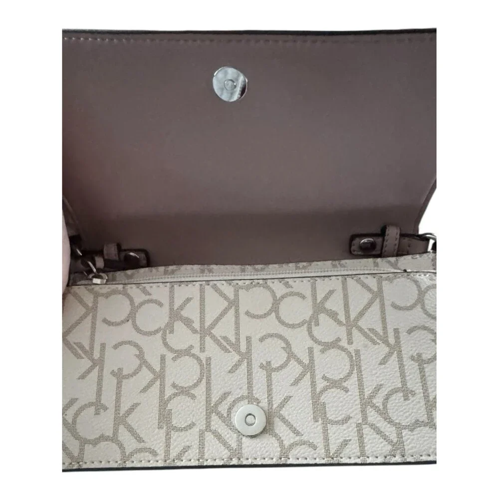 Calvin Klein crossbody bag, specifically identified as a Charlie Flap Crossbody - Picture 2 of 5